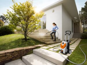 woman using Stihl pressure washer