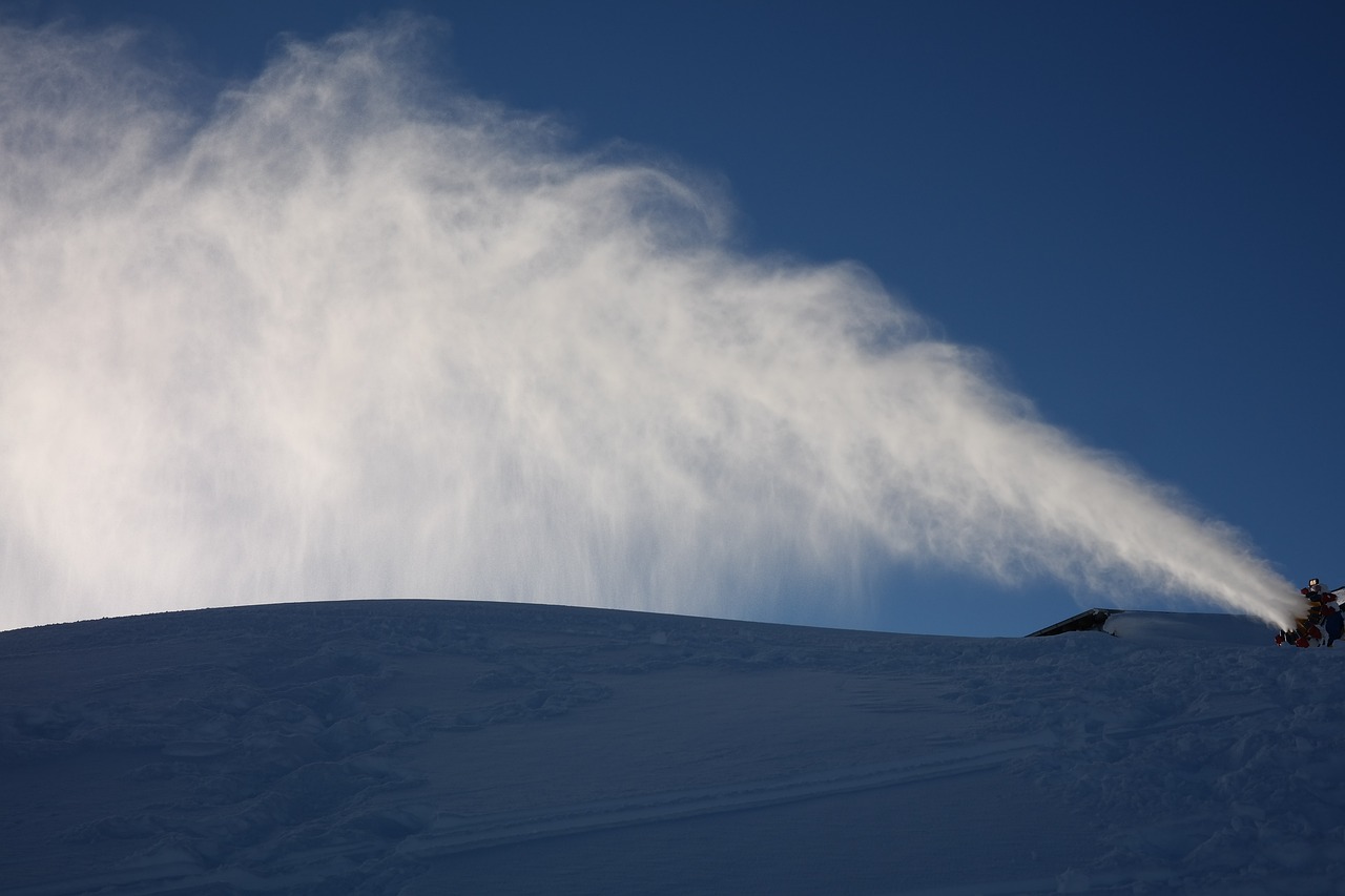 snowmaking machine in use at ski resort